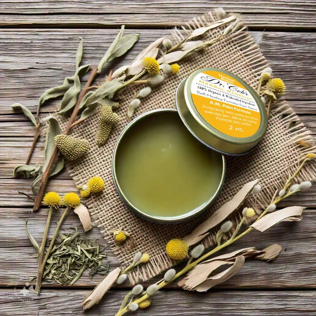 AM Pain Balm with some herbal ingredients on a burlap cloth on a wooden surface